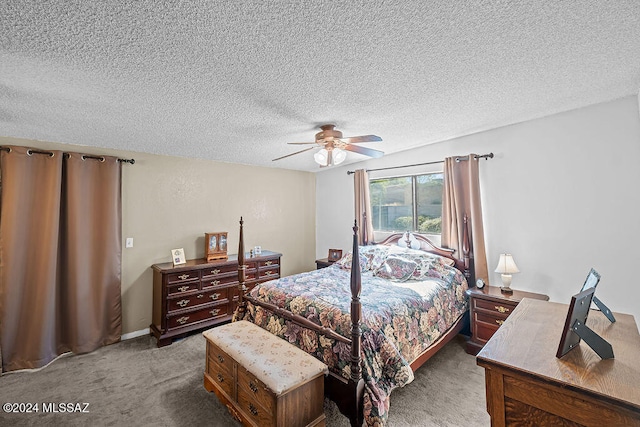 bedroom featuring carpet floors, a textured ceiling, and ceiling fan