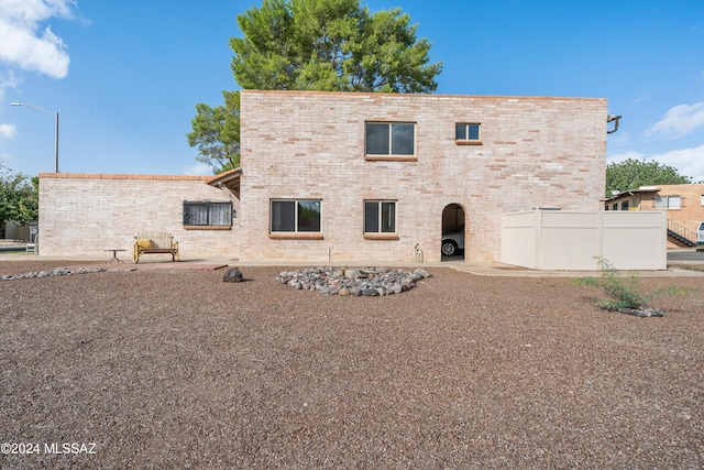 back of house with a patio area