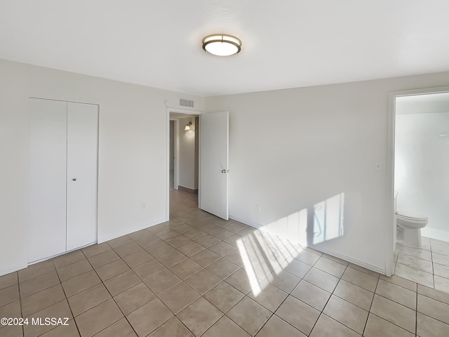 view of tiled empty room