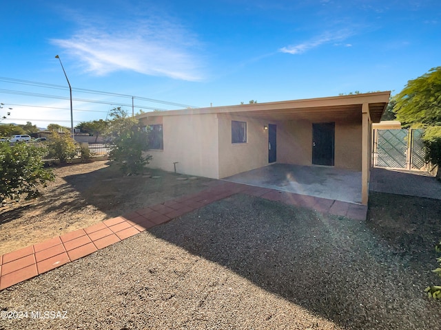 rear view of property with a patio area