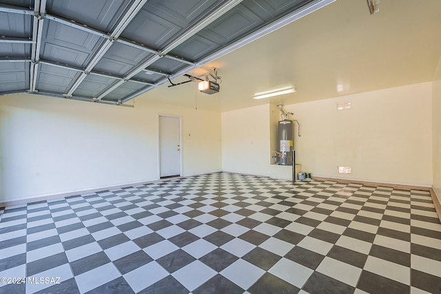 garage with a garage door opener and water heater