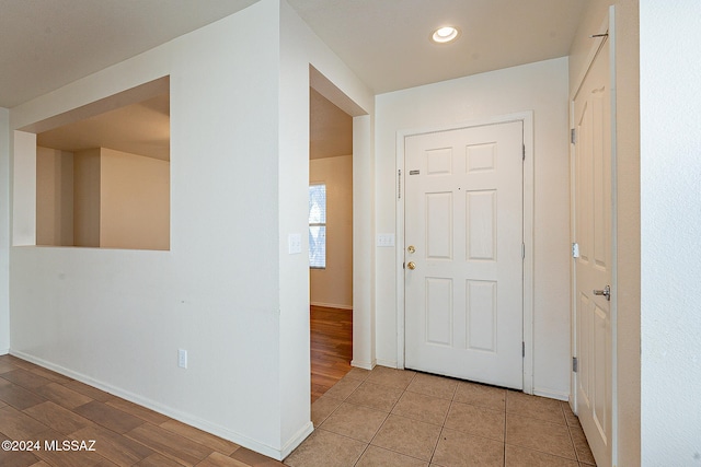 corridor featuring light hardwood / wood-style flooring