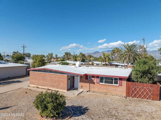 view of front of home with a mountain view