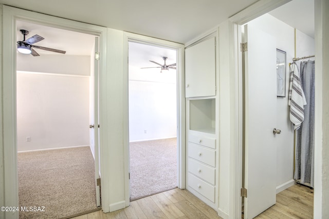 hallway featuring light wood-type flooring