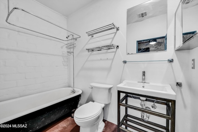 bathroom featuring toilet and a bathing tub