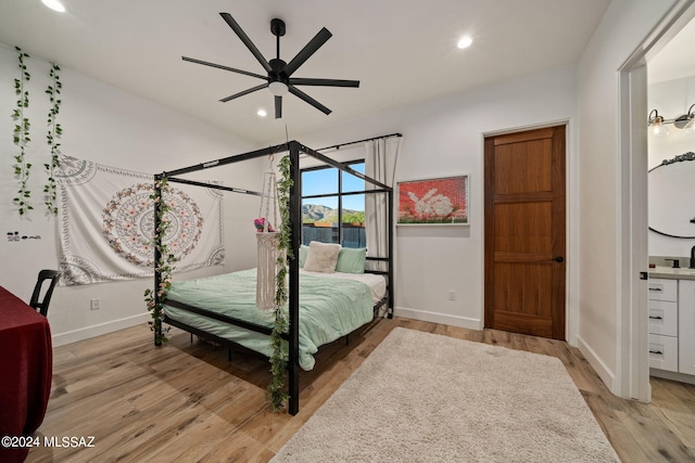 bedroom featuring a ceiling fan, light wood-type flooring, baseboards, and recessed lighting