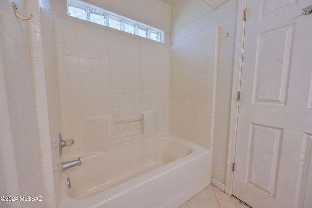 bathroom with tile patterned floors and bathing tub / shower combination