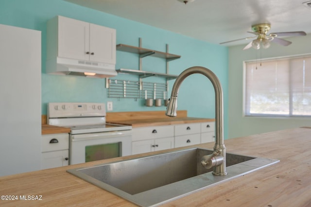 kitchen featuring hardwood / wood-style flooring, sink, ceiling fan, white cabinetry, and white range with electric stovetop