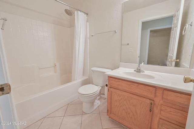 full bathroom featuring vanity, shower / tub combo with curtain, tile patterned flooring, and toilet