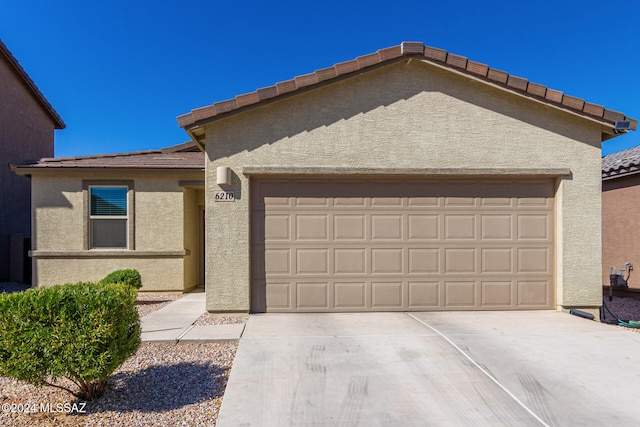 view of front of house with a garage