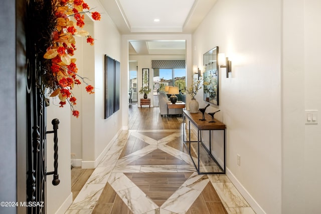 hallway with recessed lighting and baseboards