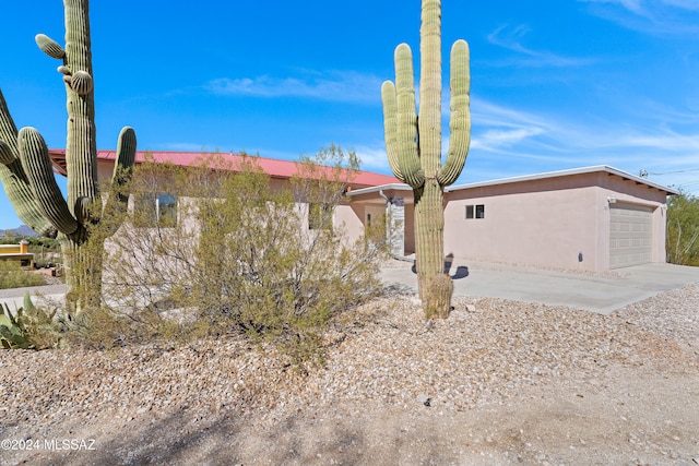 view of front of home with a garage