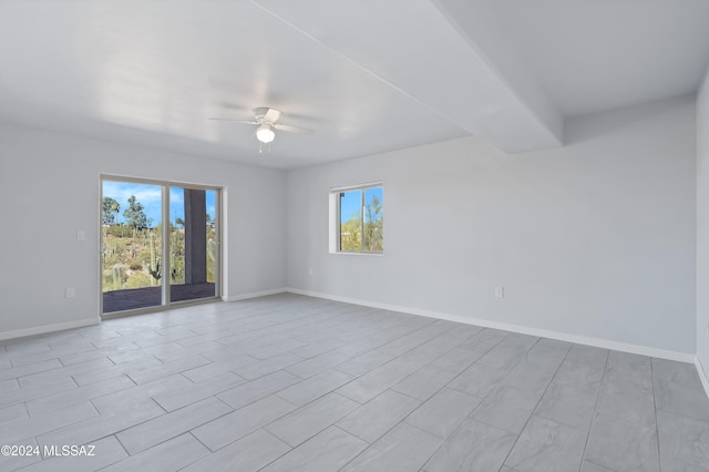 spare room featuring ceiling fan