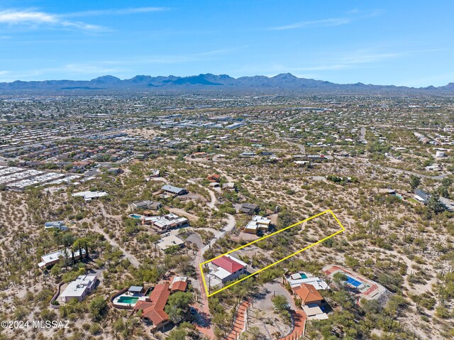 drone / aerial view featuring a mountain view