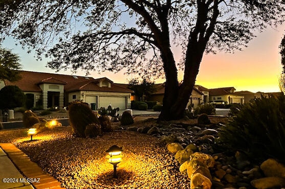 view of front of property with a garage