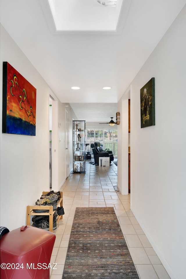 corridor with tile patterned flooring