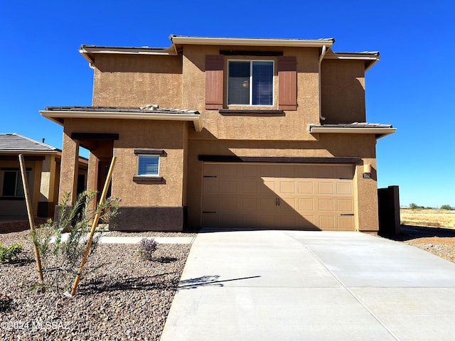 view of front of home with a garage