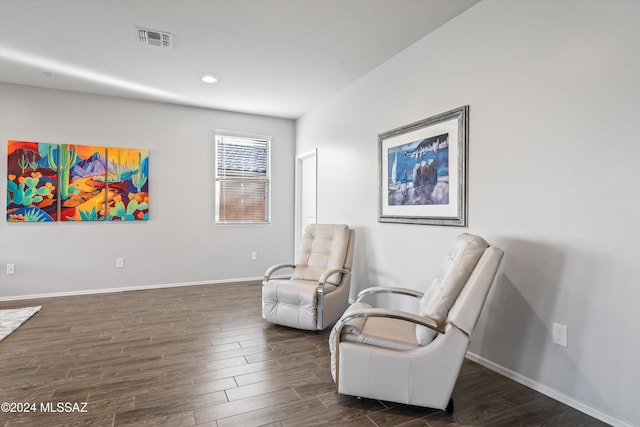 living area featuring dark hardwood / wood-style flooring