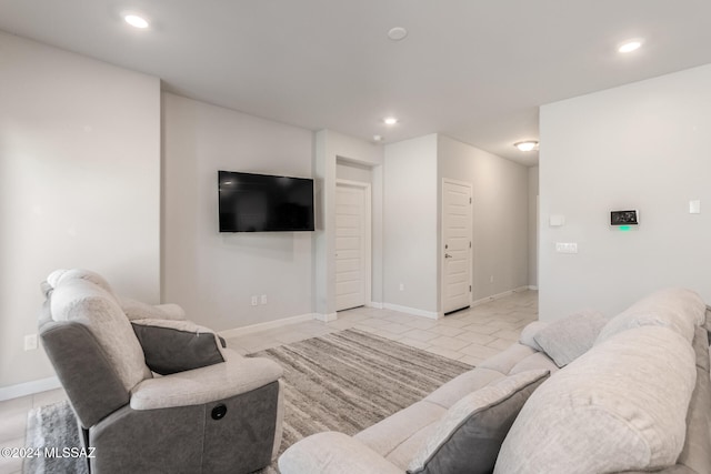 living room with light tile patterned floors