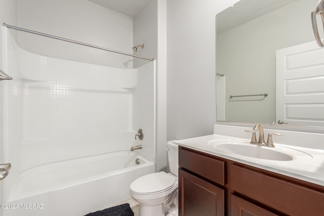 full bathroom featuring vanity, shower / washtub combination, and toilet