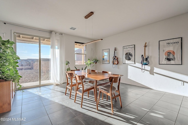 view of tiled dining space