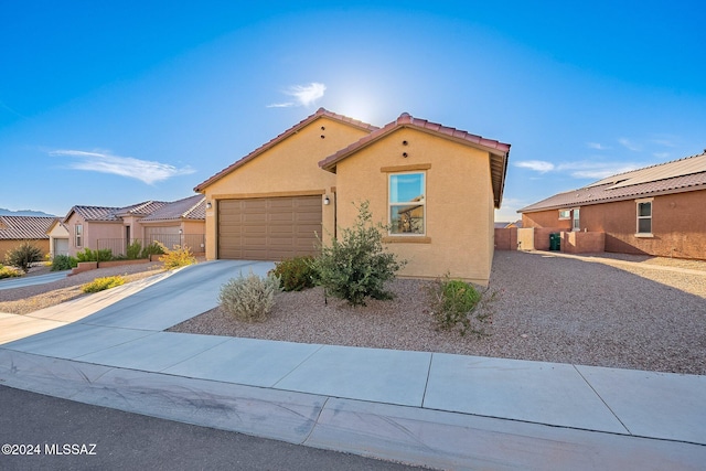 view of front of home featuring a garage