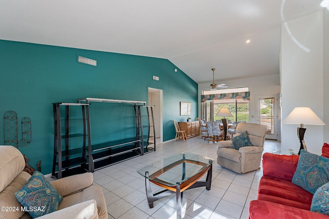 tiled living room with lofted ceiling and ceiling fan