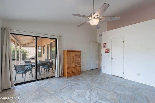 unfurnished bedroom with ceiling fan, vaulted ceiling, and access to exterior