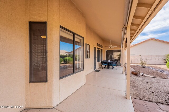 view of patio / terrace featuring ceiling fan