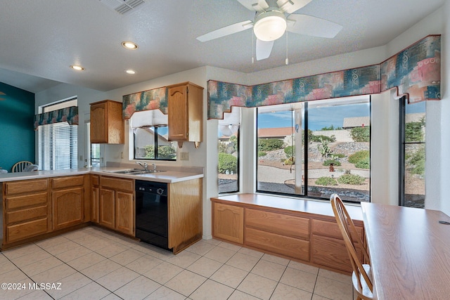 kitchen with black dishwasher, sink, light tile patterned flooring, a textured ceiling, and ceiling fan