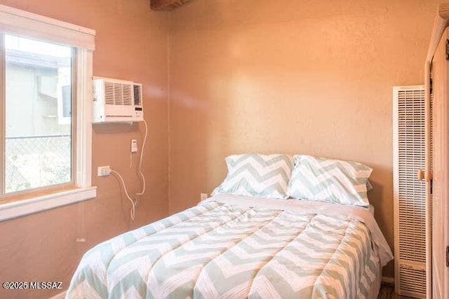 2112 E 18th St, Tucson, AZ 85719 - bedroom with a closet and a wall mounted AC