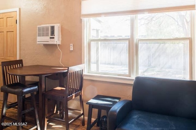 2112 E 18th St, Tucson, AZ 85719 - dining space featuring a wall mounted air conditioner