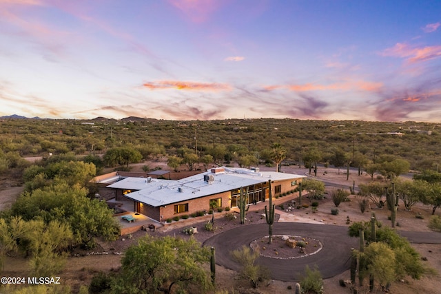 view of aerial view at dusk