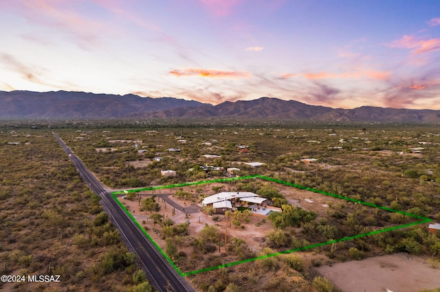 drone / aerial view featuring a mountain view