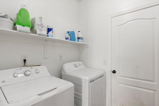 laundry room with separate washer and dryer