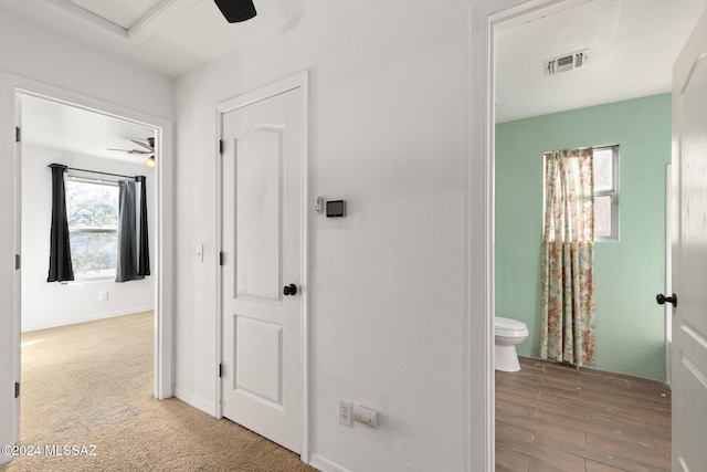 hall with light wood-type flooring