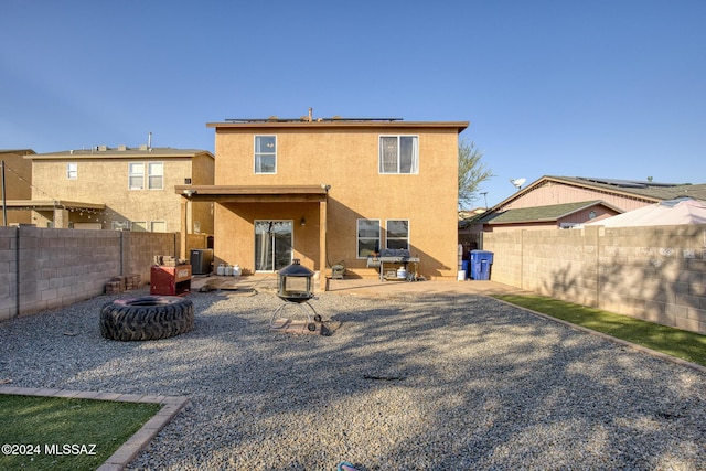 back of property featuring a patio area and central AC unit