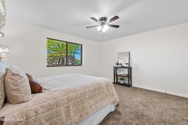 bedroom featuring light carpet and ceiling fan