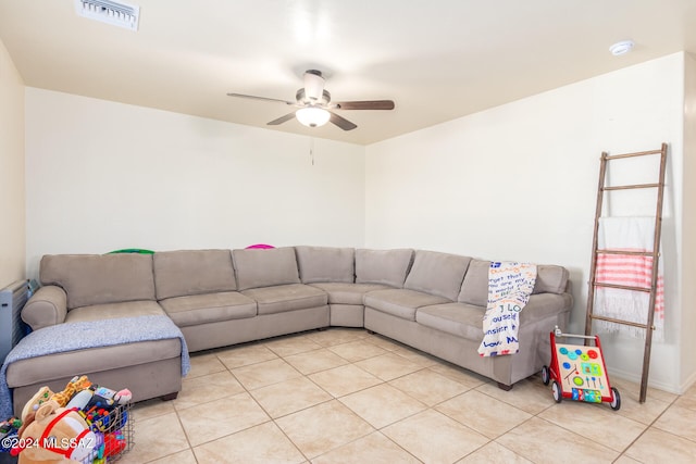 living room with light tile patterned flooring and ceiling fan