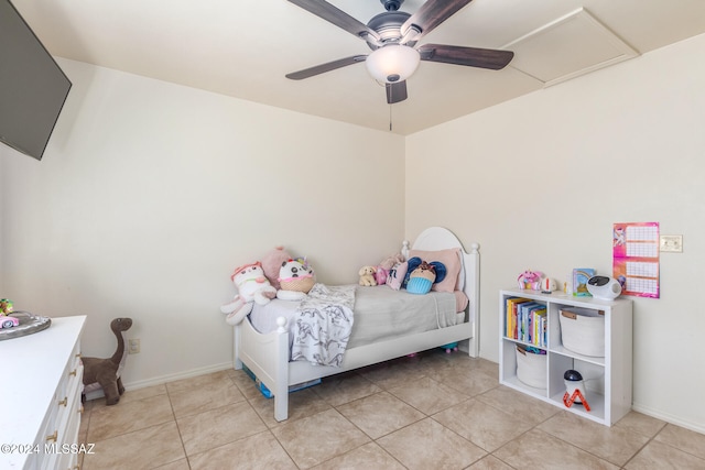 tiled bedroom featuring ceiling fan