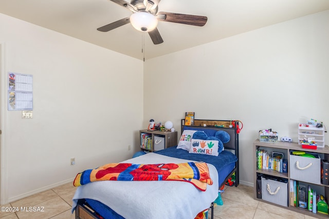 bedroom featuring ceiling fan and light tile patterned floors