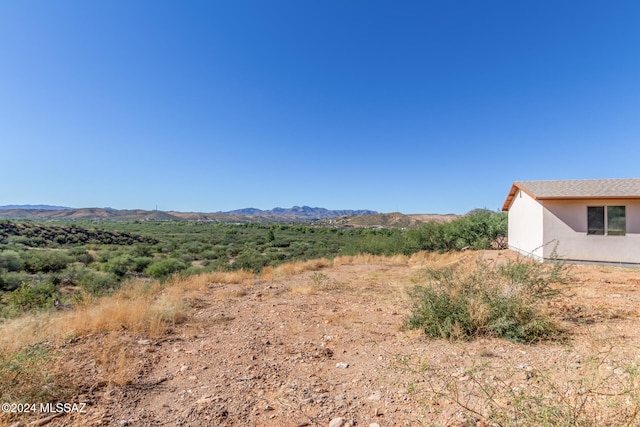 exterior space featuring a mountain view