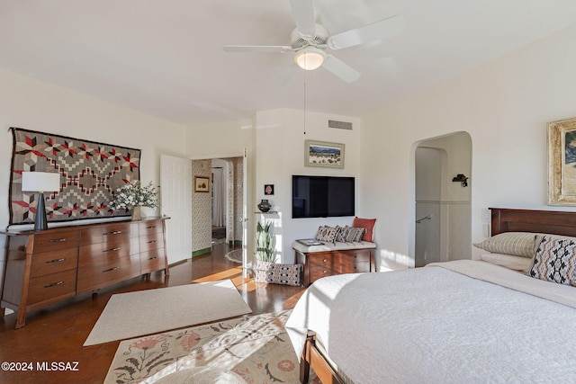 bedroom with dark wood-type flooring and ceiling fan