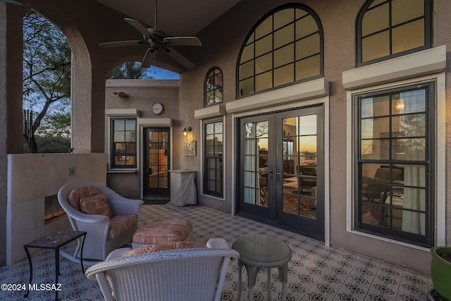 view of patio / terrace with ceiling fan and french doors