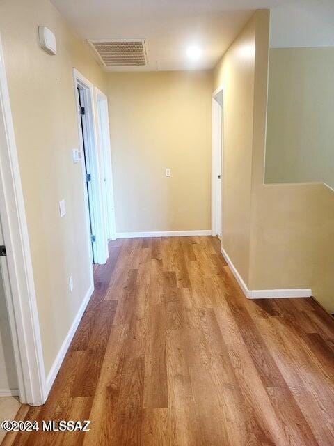 hall featuring hardwood / wood-style floors