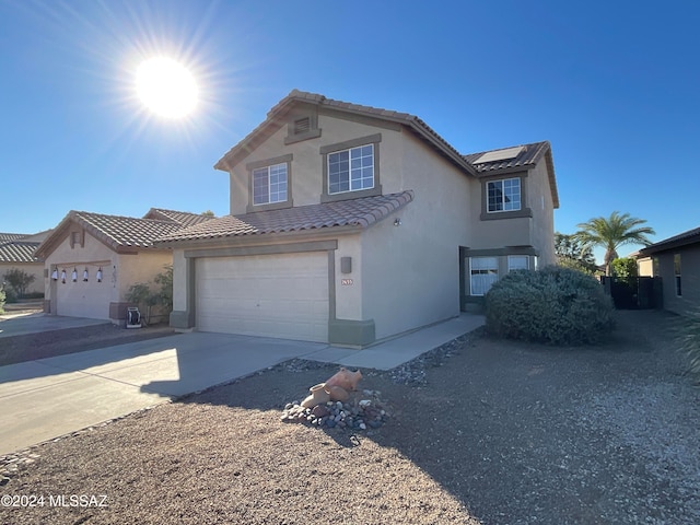 view of property with a garage