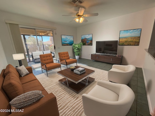 tiled living room with ceiling fan