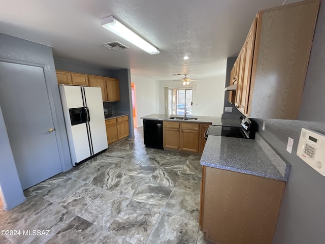 kitchen featuring sink, kitchen peninsula, ceiling fan, and black appliances