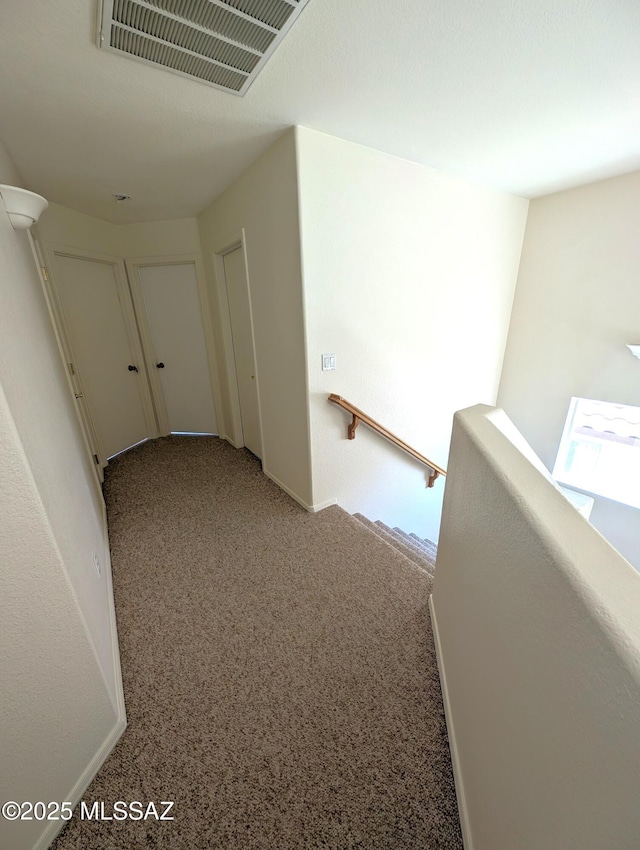 2655 W Desert Brook Ct, Tucson, AZ 85742 - hall with an upstairs landing, carpet flooring, and baseboards