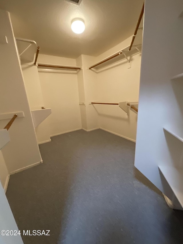 2655 W Desert Brook Ct, Tucson, AZ 85742 - walk in closet featuring dark carpet